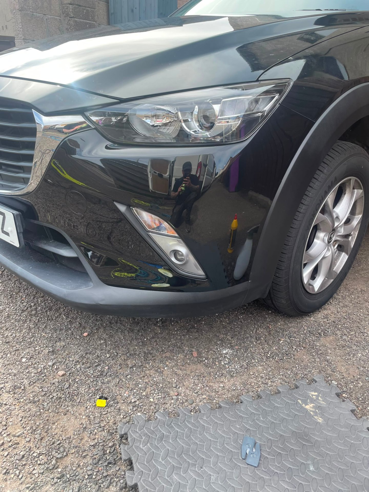Mazda CX-3 black front bumper paint repair polished to mirror finish