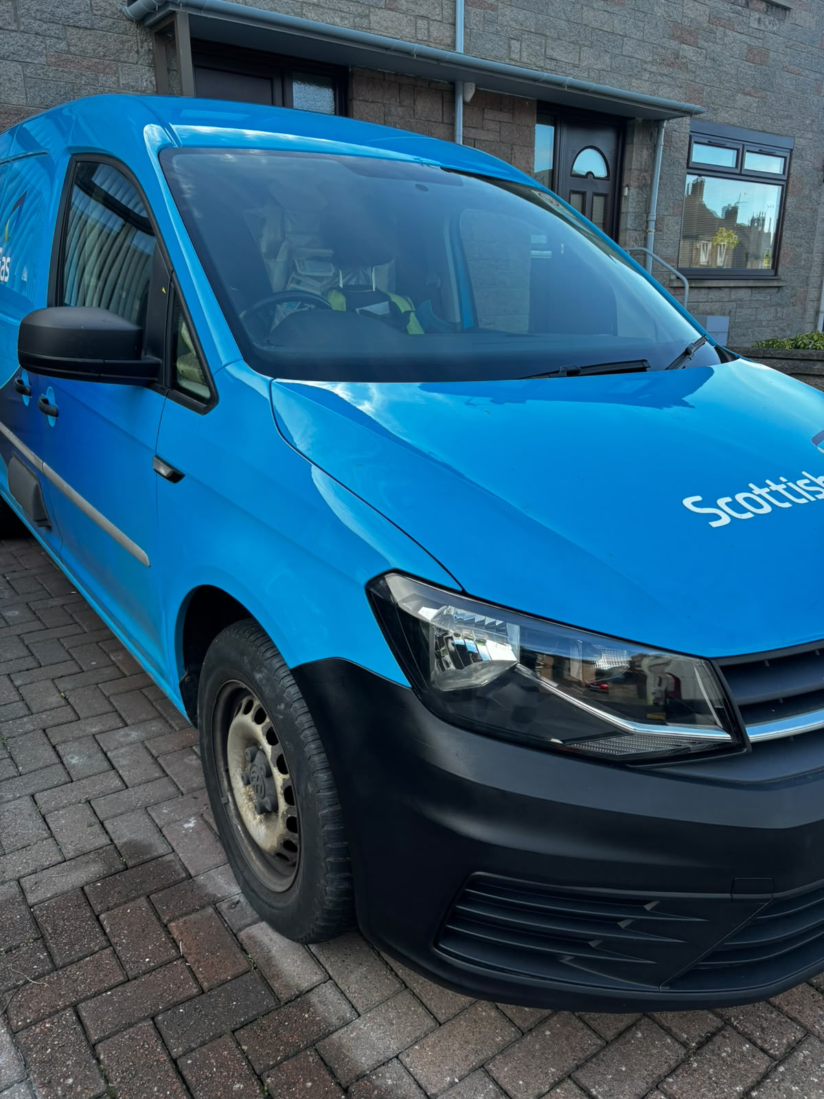After, Scottish Gas Volkswagen Caddy, dented front wing pulled, filled and repainted
