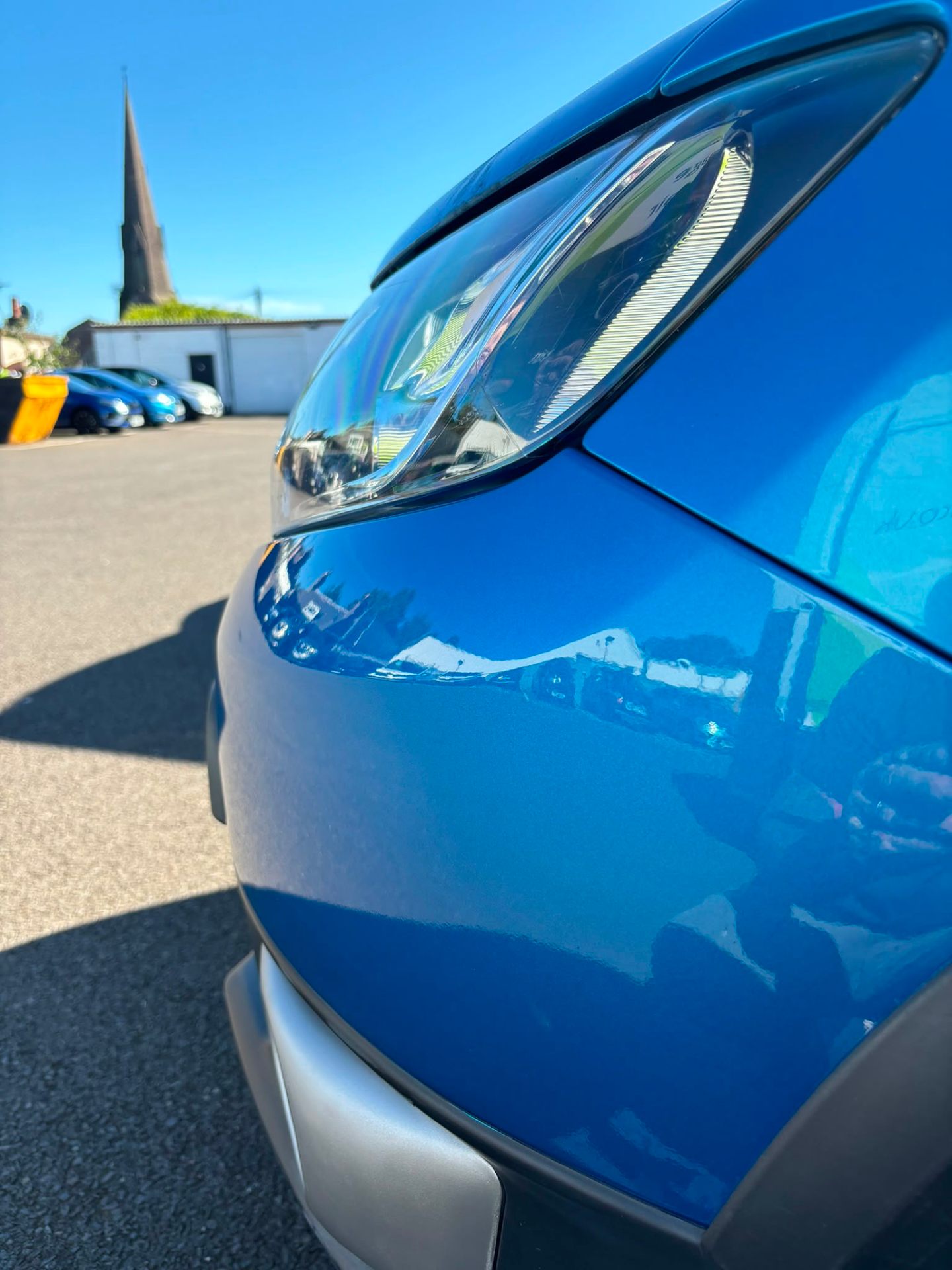 Blue van front bumper SMART repair completed on-site