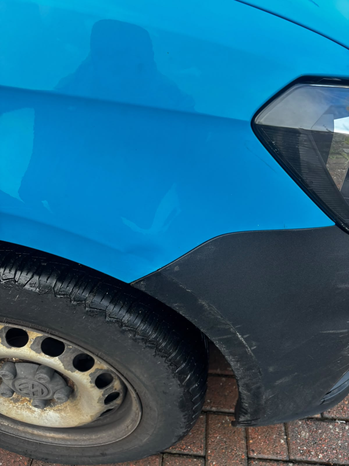 Volkswagen van blue front wing paintless dent repair completed